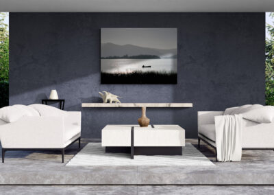 Modern minimalist living room with contemporary furniture and artwork.