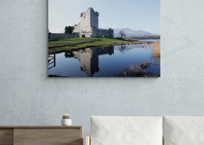 Ross Castle reflected in the lake in Ireland, a popular Irish castle