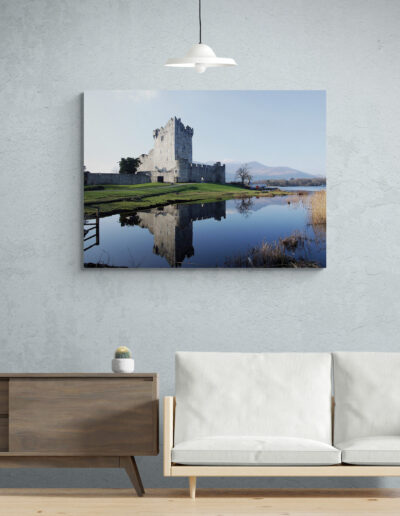 Ross Castle reflected in the lake in Ireland, a popular Irish castle