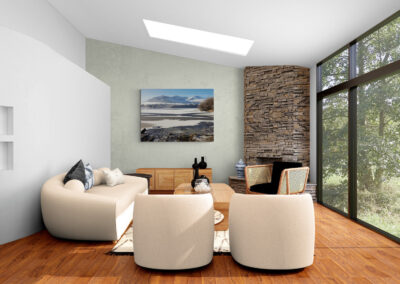 Modern living room with stone fireplace, contemporary furniture, and large window overlooking nature.