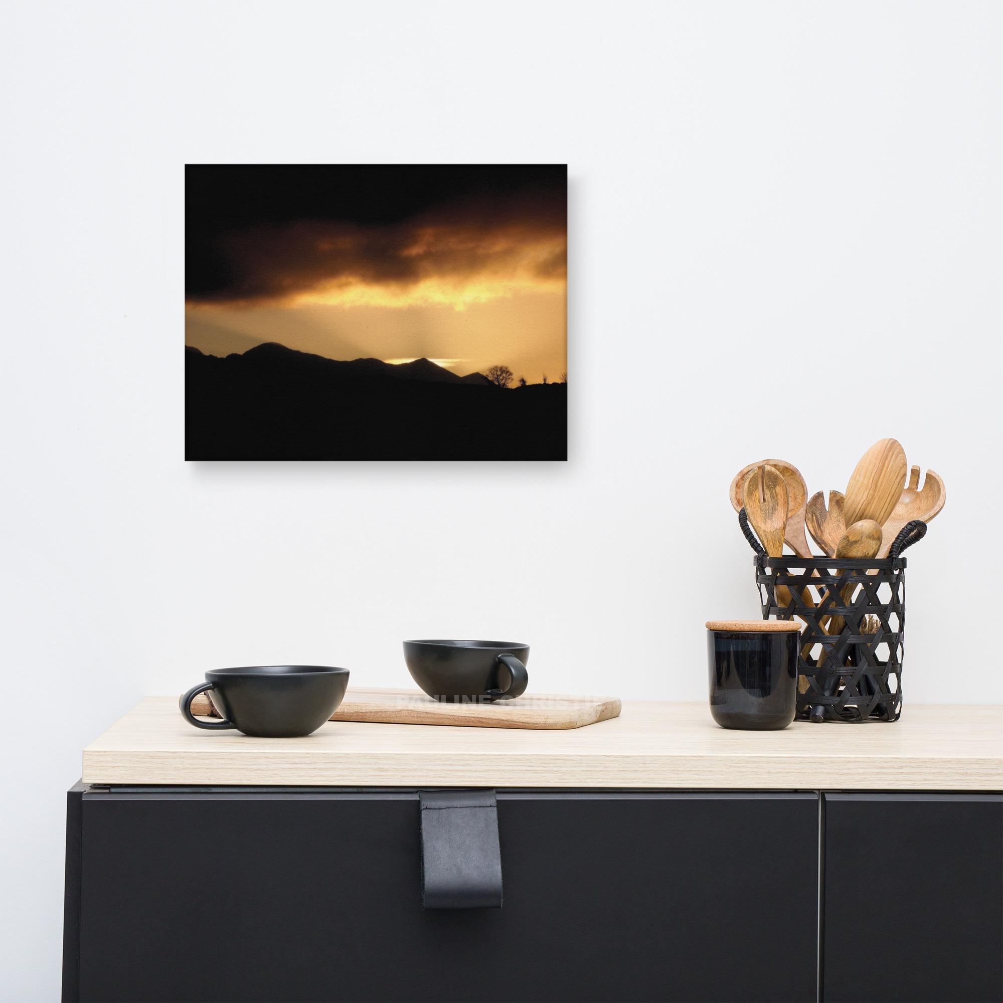 Sunset silhouette over Killarney mountains with dramatic sky
