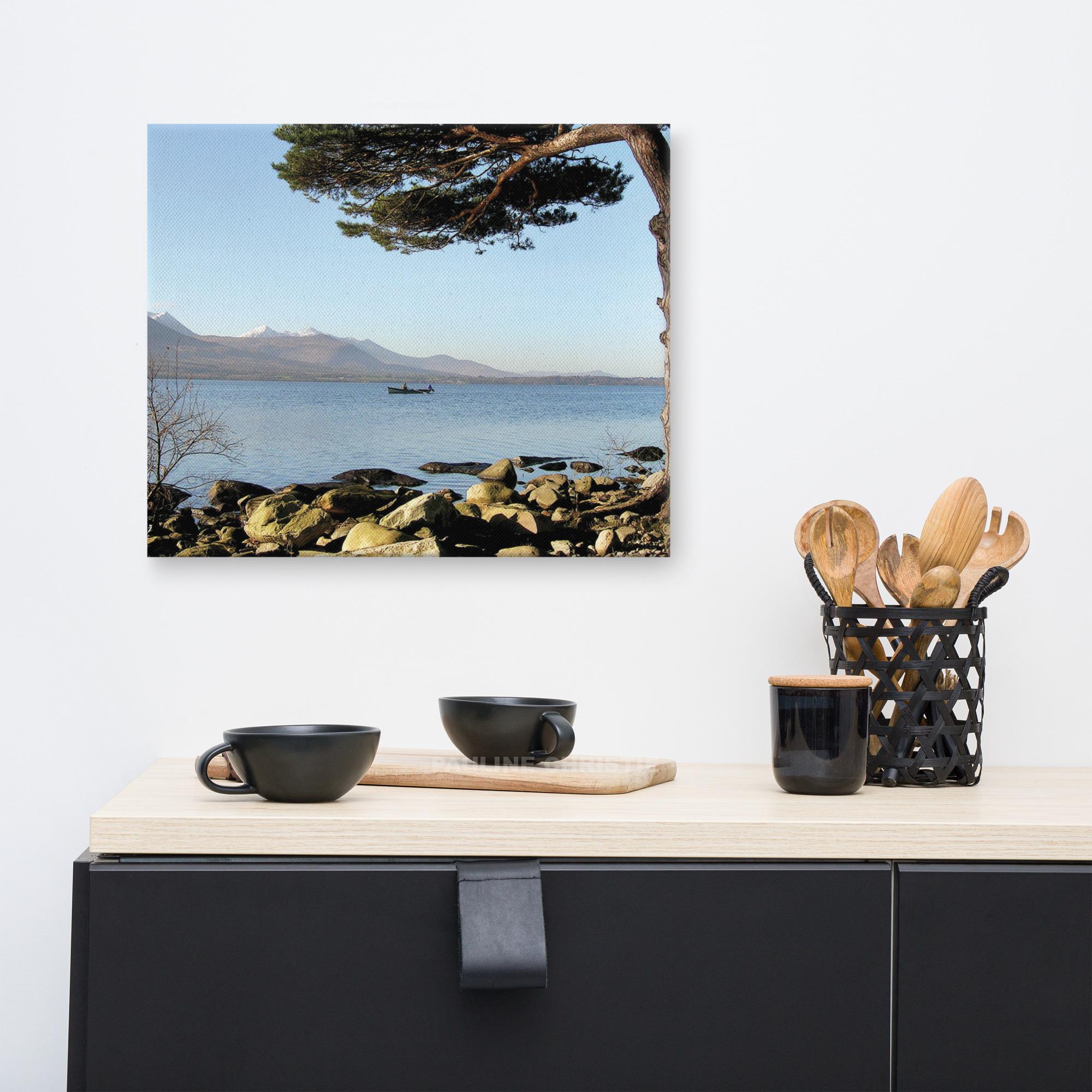 Canvas print of Killarney Lakes with a lone fisherman and a large tree.
