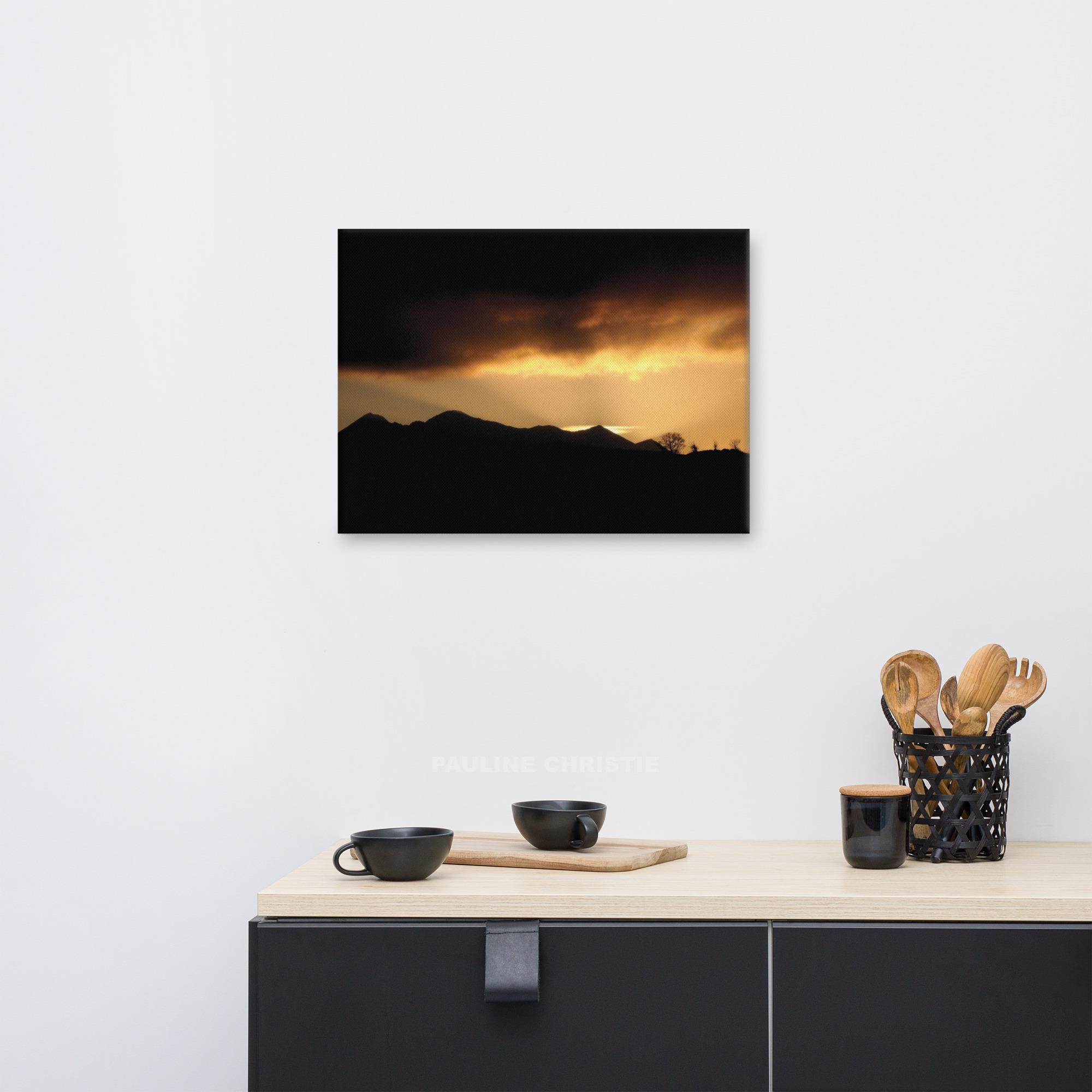 Sunset silhouette over Killarney mountains with dramatic sky