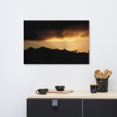 Sunset silhouette over Killarney mountains with dramatic sky