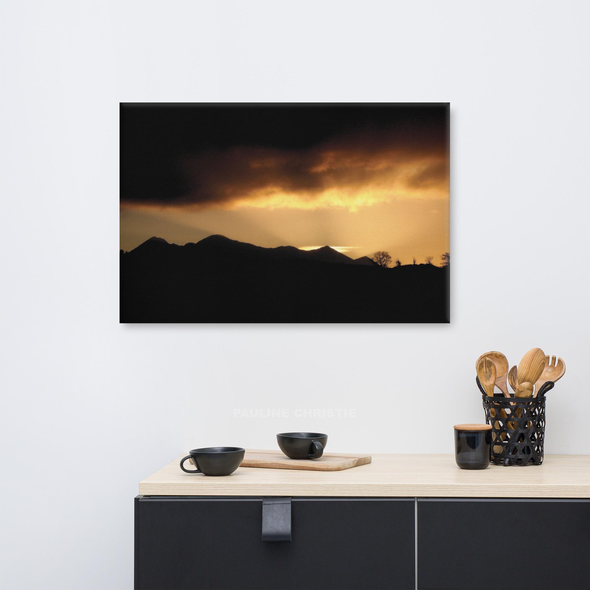 Sunset silhouette over Killarney mountains with dramatic sky
