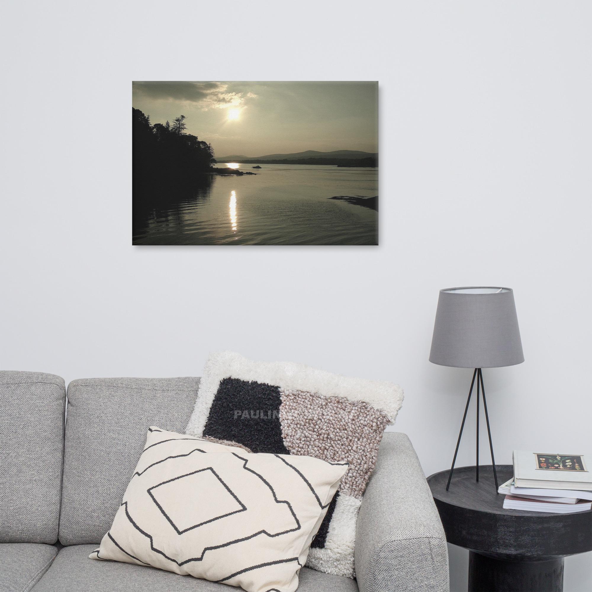 Sunset over Kenmare Bay, with sun reflecting on the water